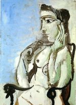 Female nude sitting in the armchair